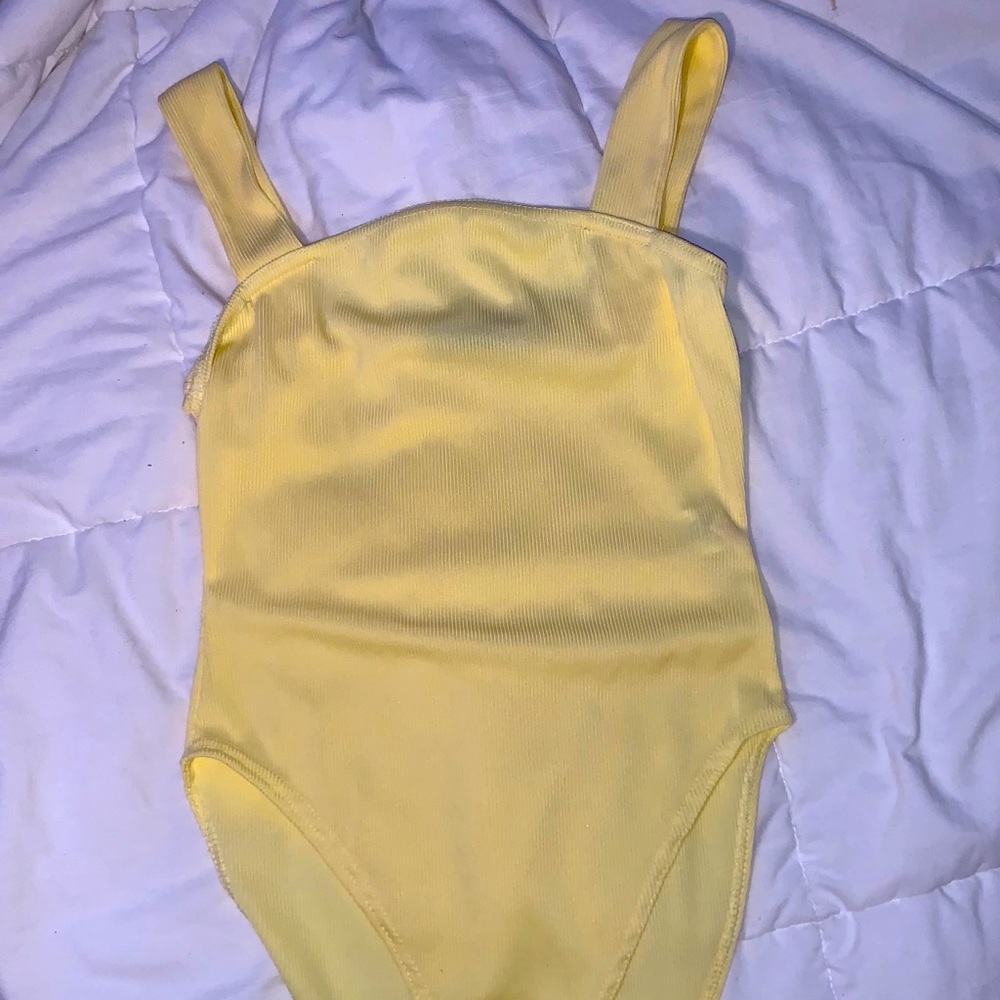 Yellow body suit